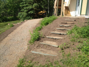 peterson-excavating-and-landscaping-duluth-minnesota-installing-steps-outdoors